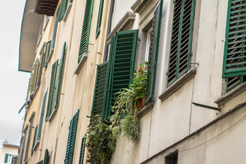 Old house with shutters in Florence, Italy