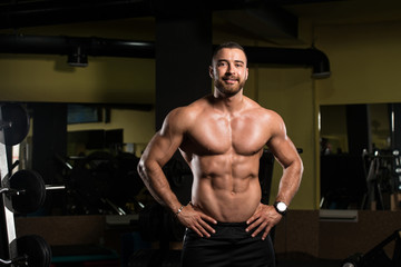 Fototapeta na wymiar Portrait Of A Fitness Muscular Man