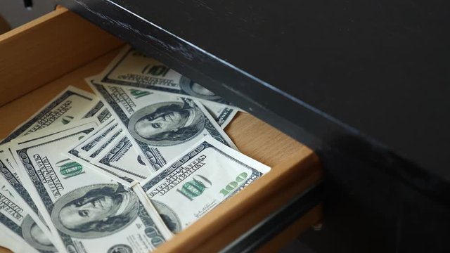 corruption, bribery and fraud concept - close up of businessman taking money. 4k, slow motion