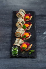 Mini sandwiches food set. Brushetta or authentic traditional spanish tapas for lunch table. Delicious snack, appetizer, antipasti on party or picnic time. Top view.