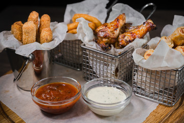 Snack for beer in the form of nuggets cheese rings and fried chicken legs