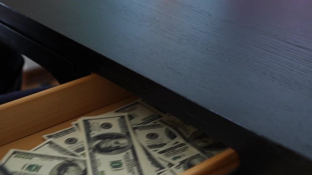 corruption, bribery and fraud concept - close up of businessman taking money. 4k, slow motion