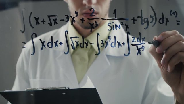 scientist wrote mathematical formulas on a blackboard. Timelapce