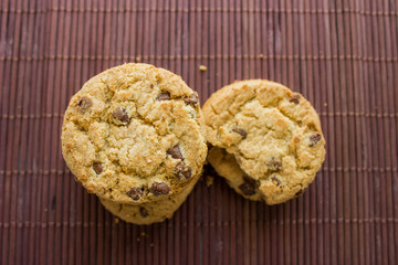 chocolate chip cookies in a wooden background
