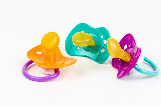 Three Cute Baby pacifiers