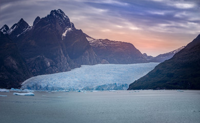 Alaska Glacier Bay landscape view from cruise ship holiday travel. Global warming and climate change concept with melting glacier with Johns Hopkins Glacier and Mount Fairweather Range mountains.