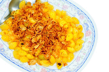 Teochew style food, stir fried Ginkgo with fried sliced garlic isolated on white background.(With selective focus and clipping path.)