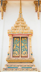 The window of church in old temple in daylight.