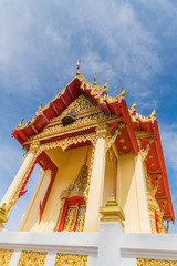 Naklejka premium The golden church in daylight and blue sky.