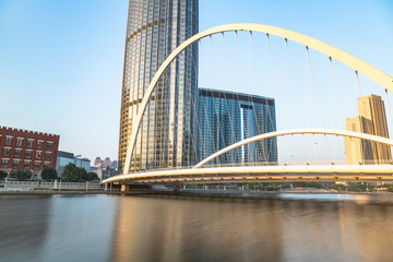 Tianjin city waterfront downtown skyline with Haihe river,China.