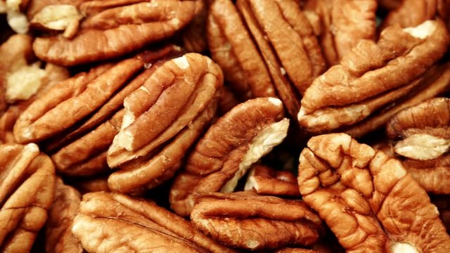 Food background. Pecan nuts close up. Dieting concept. Dolly slider shot 4K ProRes HQ codec