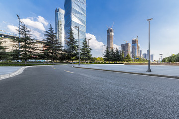 Empty Road with modern business office building 