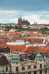 Obraz premium Prague view from above in daytime with cloudy blue sky, Vertical
