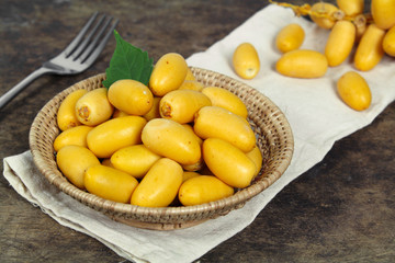 Raw yellow date palm or Dates, healthy fruit