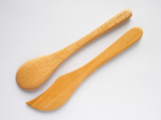 set of beech wood tea spoon and knife on white background