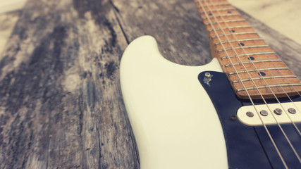 Fototapeta na wymiar A white relic electric guitar
