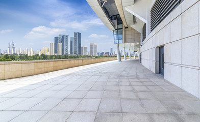 Fototapeta premium Panoramic skyline and buildings with empty road