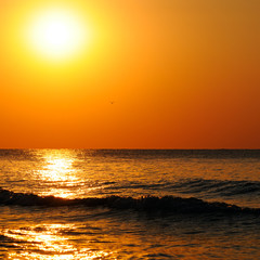 Obrazy na Szkle  Jasny zachód słońca nad oceanem