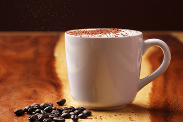 hot coffee on wood floor , mocha
