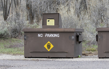 Bear proof trash can on roadside