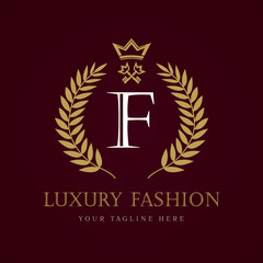 Luxury Fashion calligraphic crown key letter "F" monogram logo. Laurel elegant beautiful round logo with crown and key. Vector letter sign F for Royalty, Restaurant, Boutique, Hotel, Heraldic, Jewelry