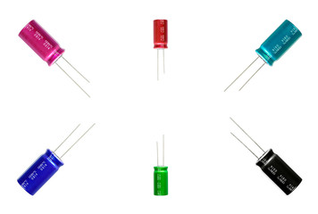 Electrolytic Capacitors, multi-color and many sizes, isolated on white background, Electronics part concept.