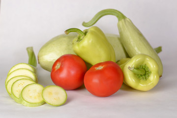 Fresh vegetables tomatoes, peppers and zucchini.