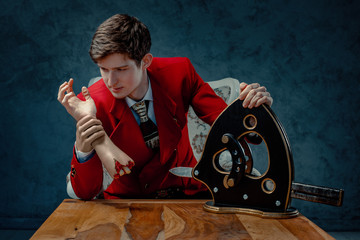 Magician with severed hand.