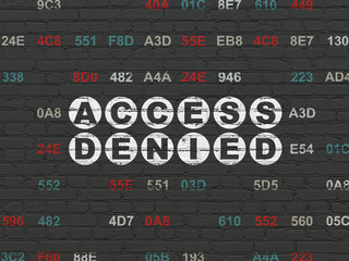 Privacy concept: Access Denied on wall background