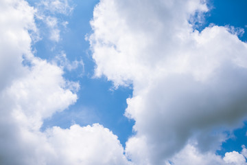 Fantastic soft white clouds against blue sky background
