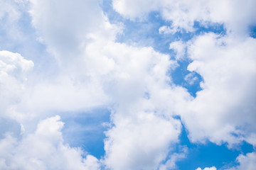 Fantastic soft white clouds against blue sky background