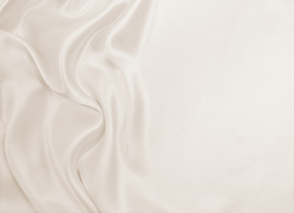 Fototapeta premium Smooth elegant golden silk or satin luxury cloth texture as wedding background. Luxurious background design. In Sepia toned. Retro style