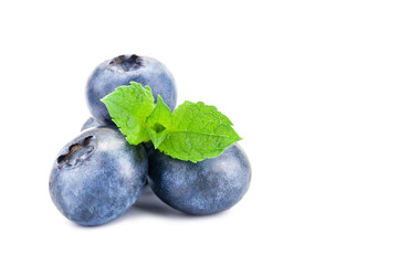 Blueberry. Fresh berries with leaves isolated on white background.