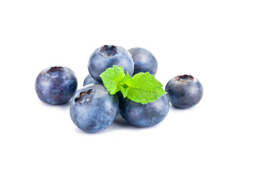 Blueberry. Fresh berries with leaves isolated on white background.