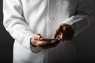 doctor touching with smartphone