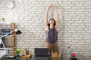 Businesswoman Stretching