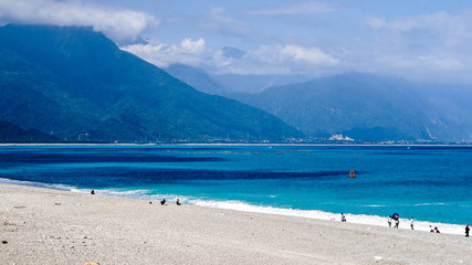 Fototapeta na wymiar Hualien ocean of Taiwan. China. Beautiful blue sea and granite pebble beach