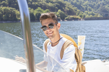 traveler navigating with the backpack and the map