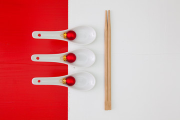 Ceramic spoons and bamboo chopsticks for sushi food