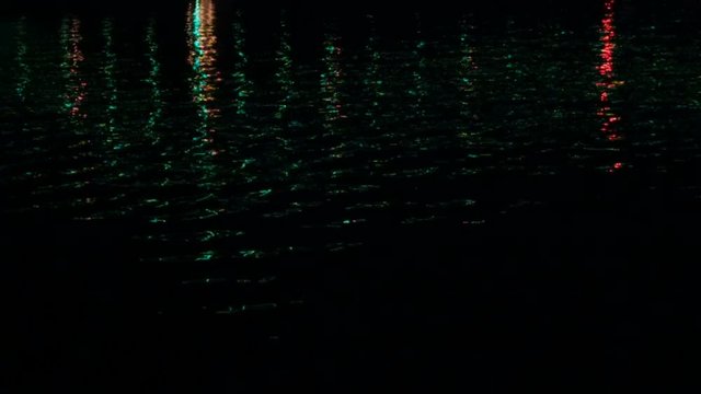 Color glare on the river from lanterns