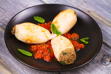 Squids stuffed with meat and vegetables.