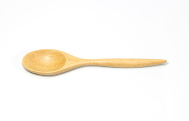 Wooden spoon on white background