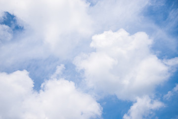 Fantastic soft white clouds against blue sky background