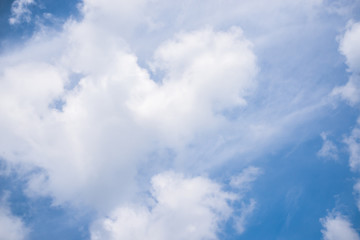 Fantastic soft white clouds against blue sky background