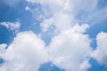 Fantastic soft white clouds against blue sky background