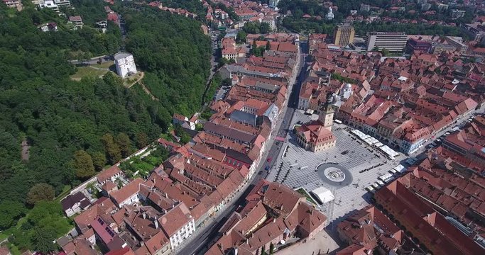 Brasov Romania aerial video footage of the Black Church and main city Square Piata Sfatului