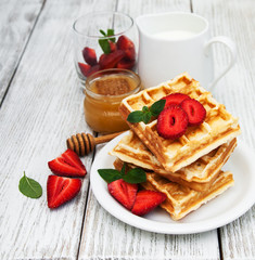 belgian waffles with strawberries and mint