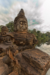 Fototapeta na wymiar On the stone bridge Ankor Cambodia
