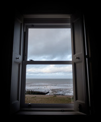 English seaside view through a hotel window. Whitstable, Kent