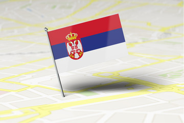 Serbia national flag location pin stuck into a city road map. 3D Rendering